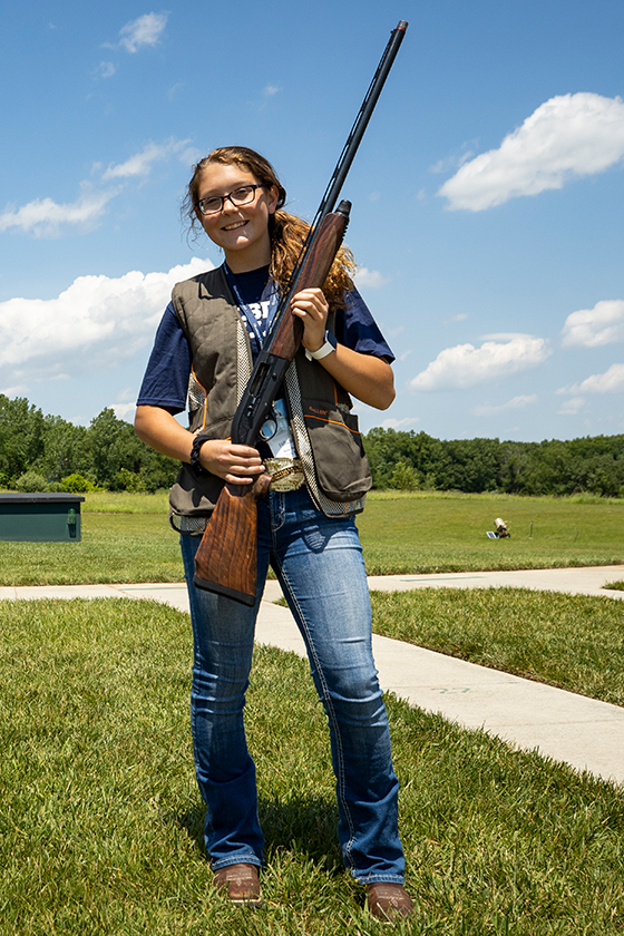 A Liberty Youth Conference participant poses with her gear.