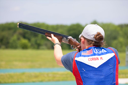 A young shooter participates in a skeet championship.
